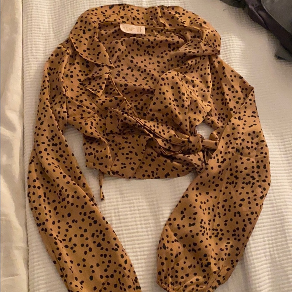 Club London cropped long sleeve blouse